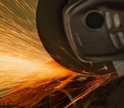 Sparks flying from an abrasive wheel