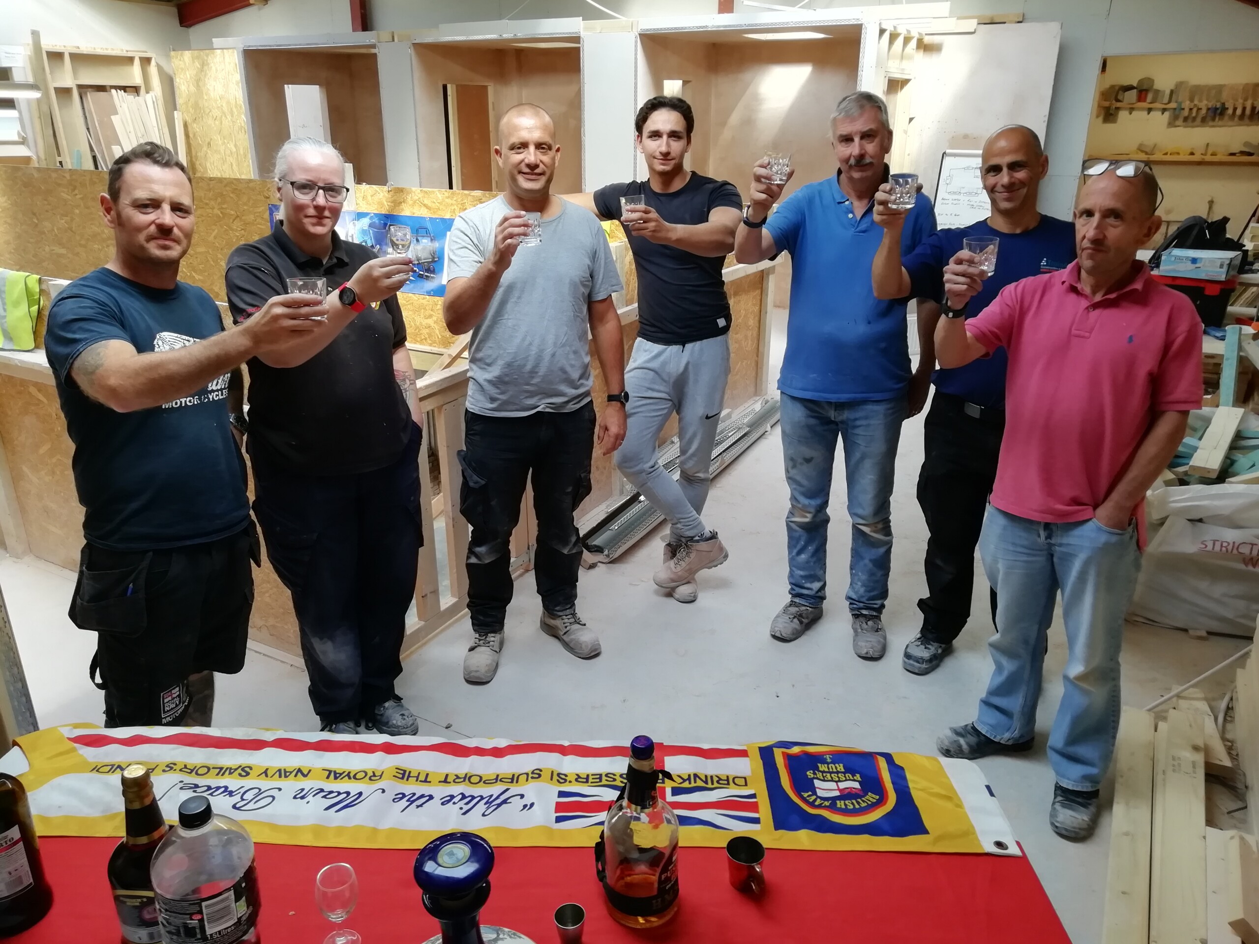 Picture of Armed Forces learner raising a toast to our new King